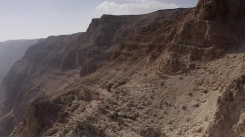 Aerial view over Dead sea Coastline and Cliff mountains