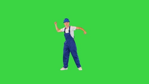 Happy and Excited Construction Worker Dancing on a Green Screen Chroma Key