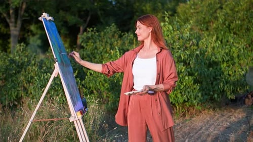 Favorite Hobby Beautiful Smiling Artist Draws a Creative Picture with Paints and Brushes Outdoors in