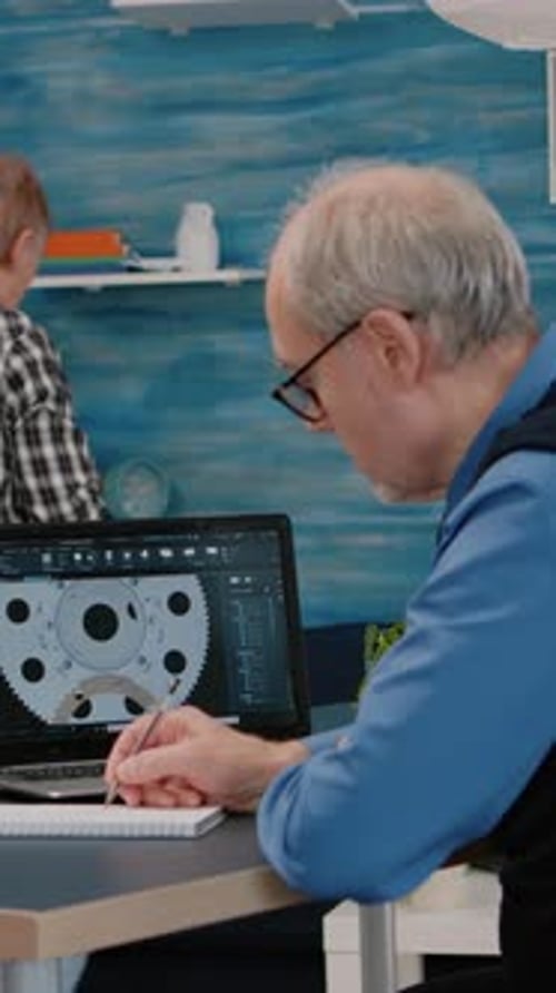 Vertical Video Senior Man Architect Working on Modern Cad Program Analysing Gears Design