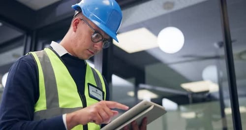 Construction, online and man on tablet in office for inspection, renovation project and report
