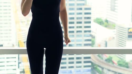 Woman doing workout at home in the morning