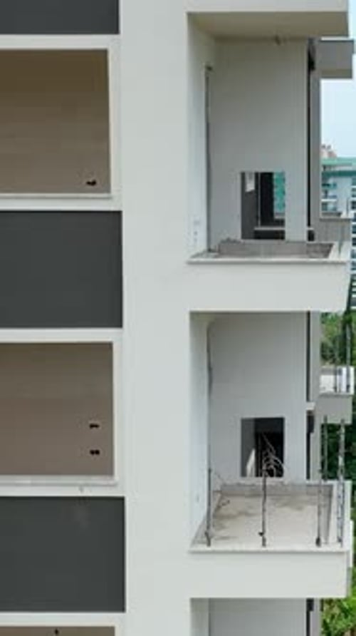 Vertical Video House Makeover Window Installation and Facade Transformation