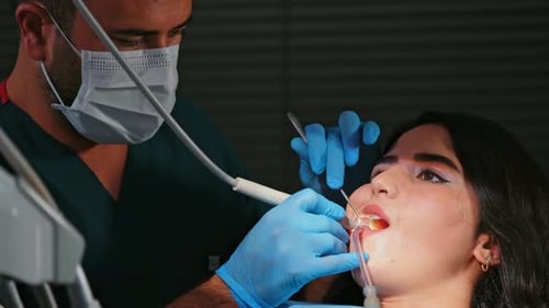Dentist Doing a Dental Treatment on a Patient