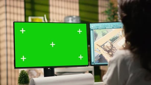 Real Estate Developer Reviews Project Blueprints with Chroma Key
