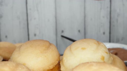 Pastry Chef Joins Two Half Biscuits in the Form of a Nut, Super Macro