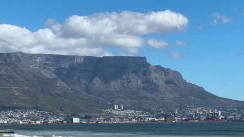 View of Table Mountain with clouds, as viewed from Milnerton Lagoon.
Cape Town