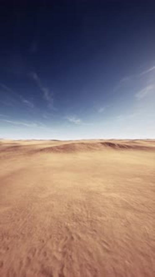 Vast Desert Landscape Under Clear Blue Sky