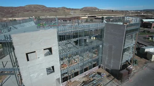 Drone shot of an industrial building under construction in downtown Denver