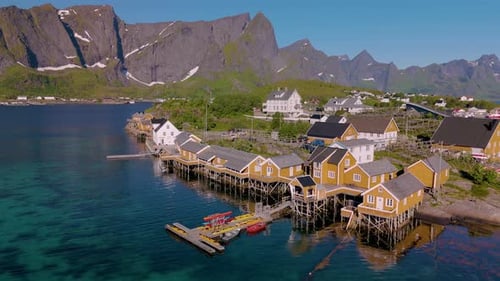 Explore the Serene Beauty of Norways Coastal Village with Stunning Mountain Views