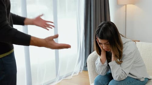 Couple Arguing, Woman Upset in Home