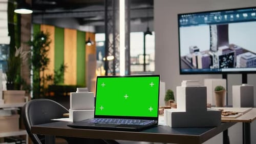 Minimalist Office Showcasing Empty Meeting Area with Copy Space on Laptop