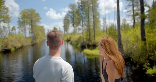 Couple on Boat in Swamp, Wetlands, Everglades