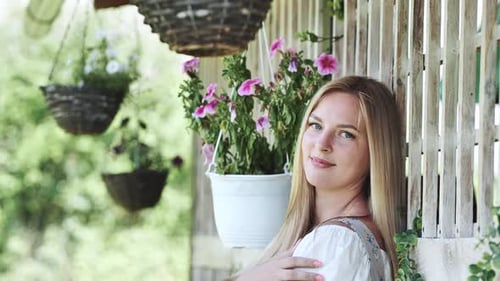 German Girl Posing Outside the House