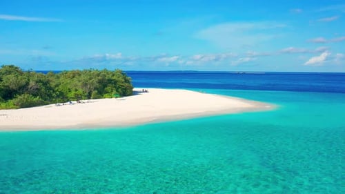 Aerial View of White Sand Beach and Turquoise Sea on Tropical Island Ukulhas Maldives