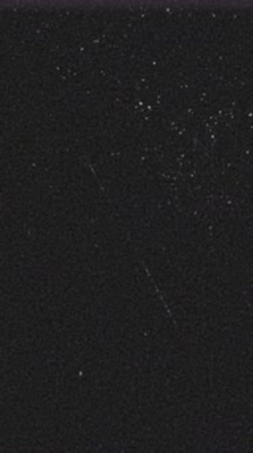Vertical Grunge Film Texture with Dust and Faint Scratches
