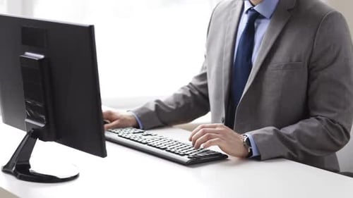 People, Business, Technology and Office Work Concept - Close Up of Businessman