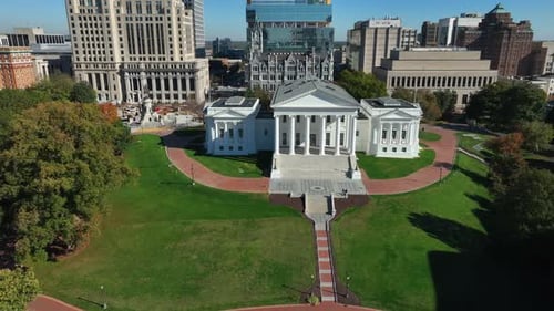 Virginia state capitol building in downtown Richmond, VA. Aerial truck shot of ornate white building