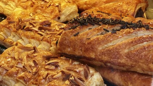 Freshly Baked Pastries on Display at Local Bakery Shop with Selection Culinary Craftsmanship and