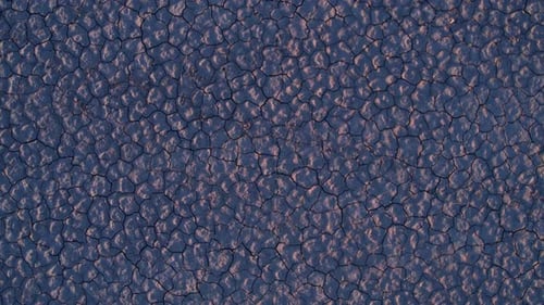 Top Down Aerial View, Cracked Soil After Drought. Dry Landscape, High Angle Drone Shot