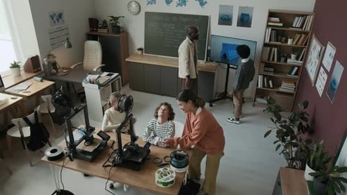 Students Learning 3D Printing in Technology Classroom