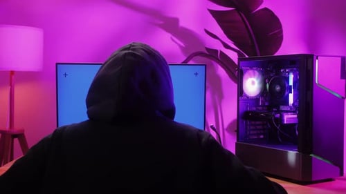 Computer with Chroma Key Green Screen on Monitor Gamer Man Playing in Popular Video Games Programmer