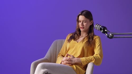 Engaging Conversation With a Digital Influencer in a Cozy Home Studio Setting