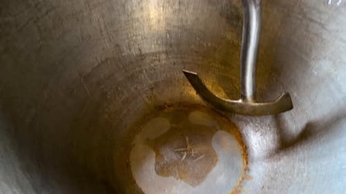 View Of An Old Traditional Machine For Bread Making - close up, tilt-up shot