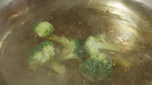Broccoli Cooking in Boiling Water Close Up