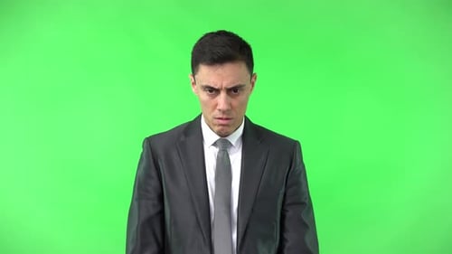 Businessman with a Confused Look on Green Screen