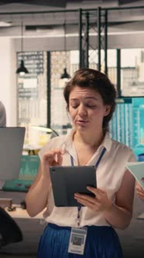 Vertical Video Portrait of Work Team Analyzing Data Analysis Results and KPI Metrics
