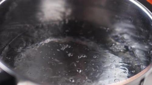 Water Boils in Stainless Steel Cooking Pot