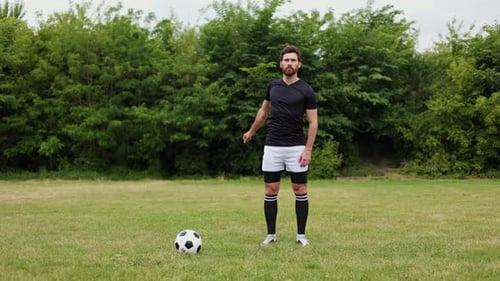 Soccer Player Ready to Kick the Ball