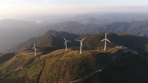 Wind Turbines in mountain during sunset