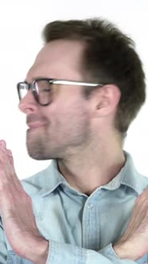 Man Gesturing No with Crossed Arms and Hands