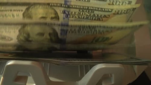 Automated Currency Counter Processing Hundred Dollar Bills