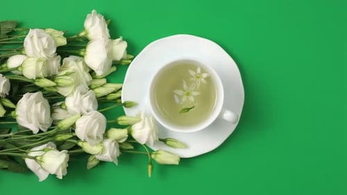Green Tea and White Flowers Still Life