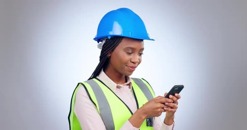Woman, helmet and engineering with phone in studio for industrial development