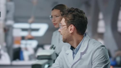 Partners Working Science Laboratory Looking Computer Closeup Smiling Researcher