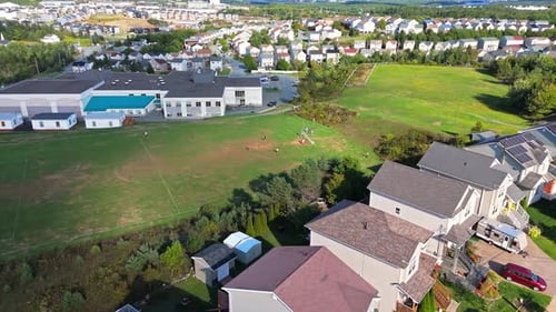 Aerial Footage Of Teens Practicing Soccer On A Sunny Day In Halifax Green Field