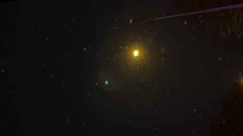 Slow Motion of Snowing at Night Weather Forecast Falling Snow in Residential Area at Night City