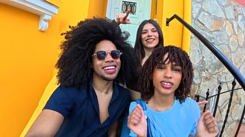 Happy Friends Posing on Colorful Urban Steps