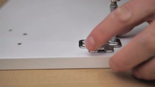 Drill Screws Into Furniture Fastener Close Up