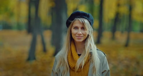 Portrait of Lady Looking at Camera in Beautiful Park in Autumn Day Calm Smile on Face Prores