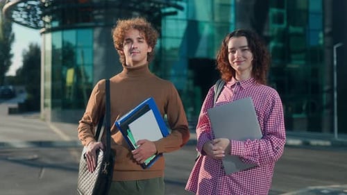 Confident University Students Portrait in Front of Modern Glass Campus