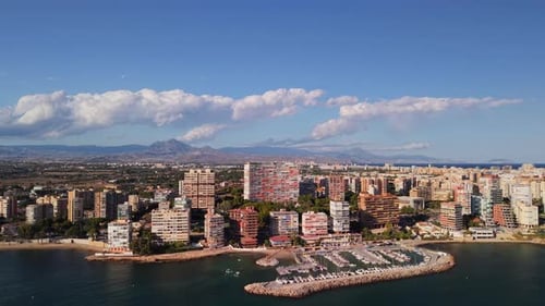 Aerial View of Albufereta District in Alicante Spain with Marina Residential Buildings and Mountains