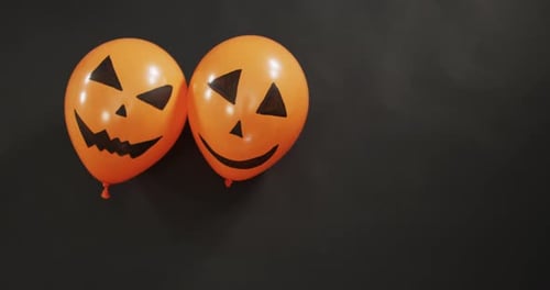 Orange Halloween Balloons with Black Jack-O'-Lantern Faces