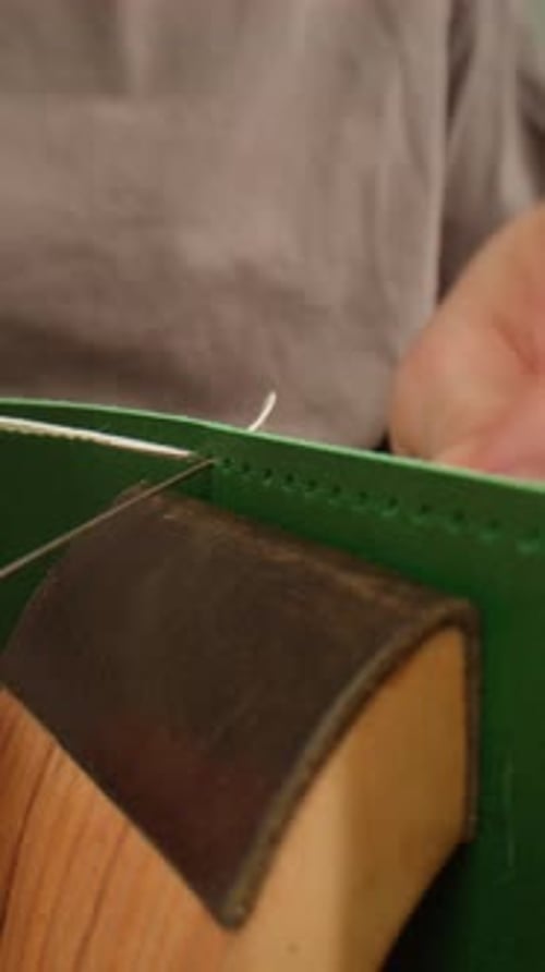 Man Tailor Repairing Belt Artificial Leather Closeup Craftsman Making Accessories Made of Genuine
