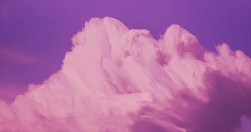 Dreamy Pink Clouds Drifting in the Sky