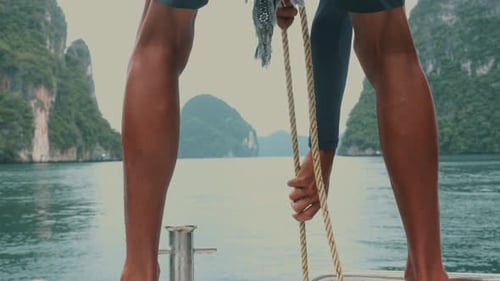 Seaman Worker on Sailing Trip in Andaman Sea on Travel Tour Thailand
